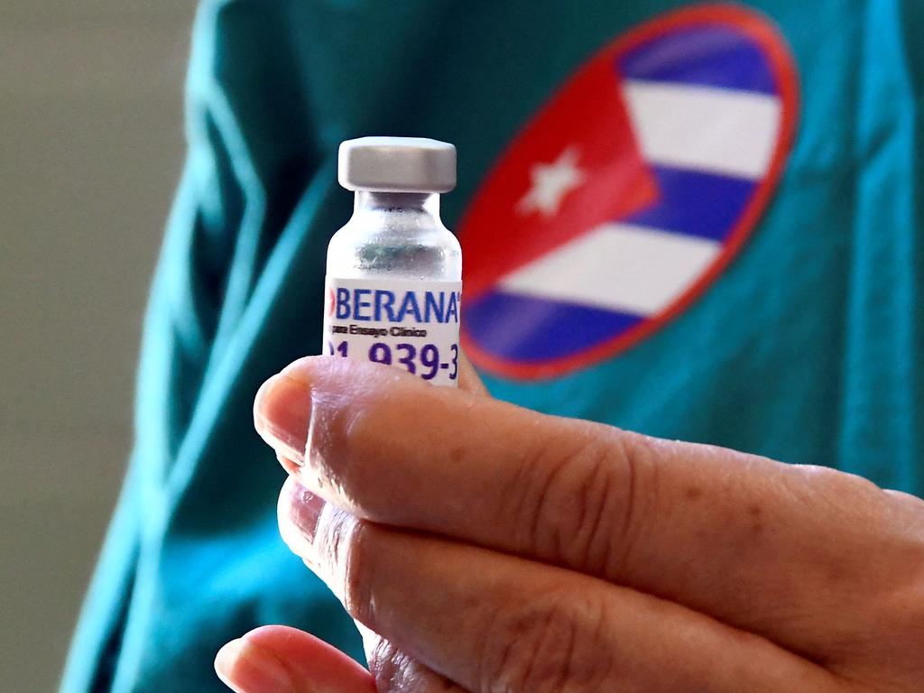 Cuban nurse Xiomara Rodriguez shows a vial of the Cuban Soberana 2 vaccine as the country starts immunising kids as young as two. Picture: Joaquin Hernandez/AFP