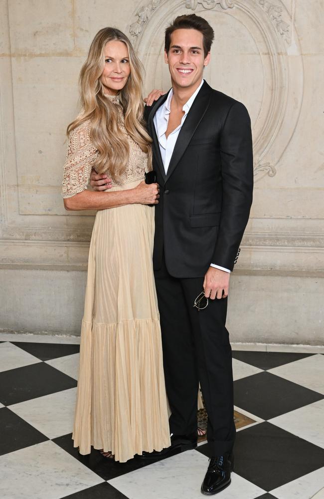 Elle stands with her eldest son, Flynn, at the Christian Dior Haute Couture show at Paris Fashion Week in 2022. Picture: Stephane Cardinale/Corbis/Getty Images