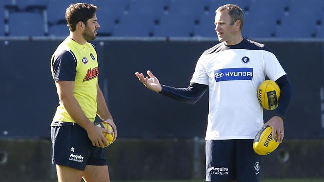 Levi Casboult works with Saverio Rocca on his goaling kicking technique. Picture: Michael Klein