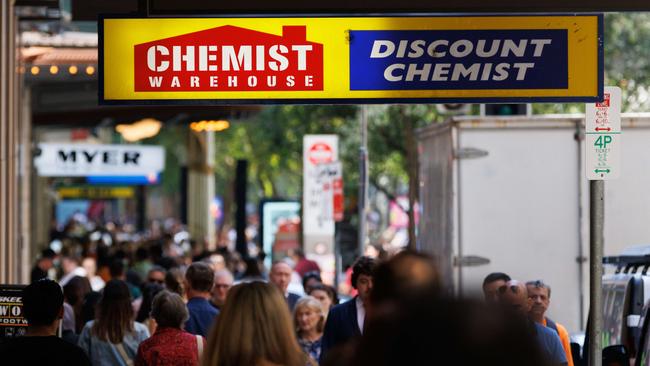 SYDNEY, AUSTRALIA - NewsWire Photos, October 29 2024. GENERIC. Inflation. Shopping. Retail. Economy. Cost of living crisis. Crowded footpath beneath a Chemist Warehouse sign. Picture: NewsWire / Max Mason-Hubers