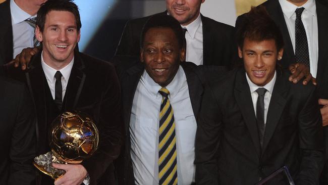 Pele pictured with two of modern football’s best ever, Lionel Messi and Neymar Jnr, in 2012. Picture: Franck FIFE / AFP