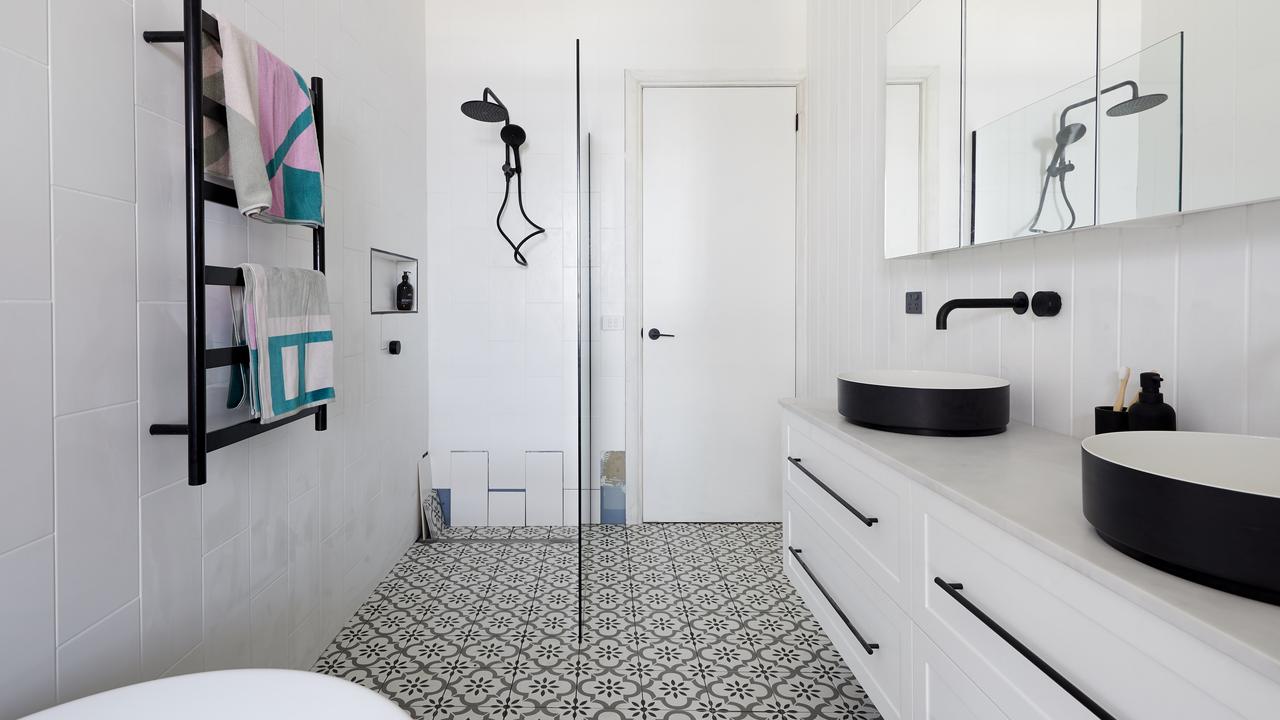 Tess and Luke went for a white tiled bathroom, but Neale thought it ‘wasn’t anything new’. Picture: The Block/ Channel 9