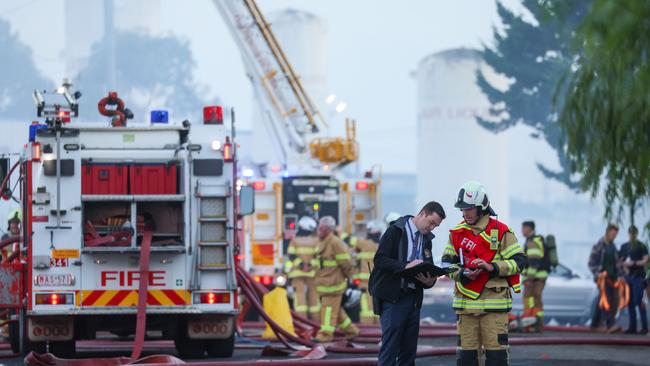 Firefighting crew and emergency response personal attend a factory fire in Sunshine. Picture: Brendan Beckett