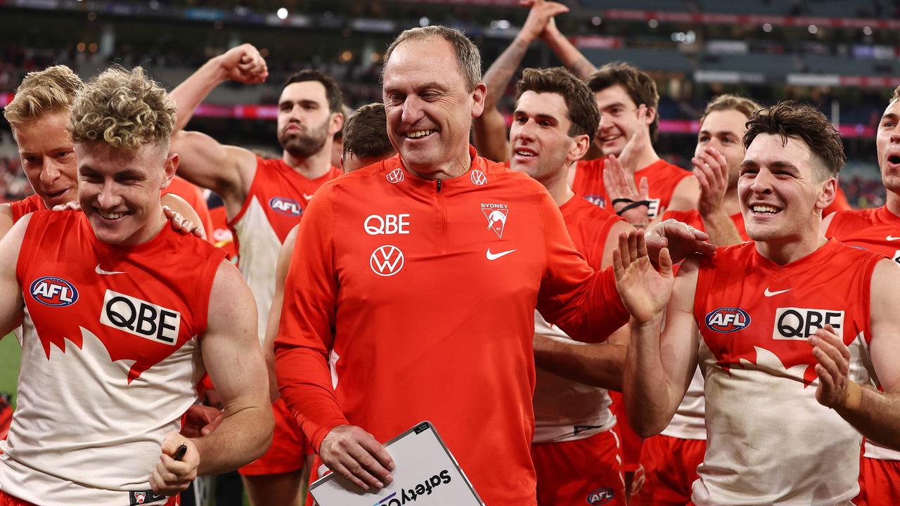 A happy John Longmire, head coach of the Sydney Swans after beating Melbourne . Picture by Michael Klein