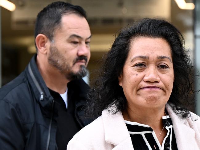 Paul Titmuss (left), and Lafo Titmuss, parents of Keith Titmuss, depart the Coroner's Court of New South Wales in Sydney, Friday, May 3, 2024. Manly Sea Eagles player Keith Titmuss, 20, collapsed during a rugby league training drill on 23 November 2020. He was transported to Royal North Shore Hospital where he later died after suffering from a cardiac arrest. (AAP Image/Bianca De Marchi) NO ARCHIVING