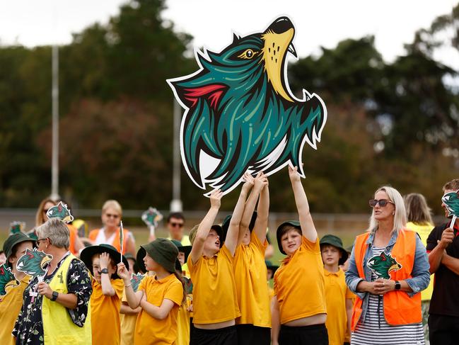 Students of Campbell Town District High School pose during the Tasmania Devils unveiling at Campbell Town Football Club. (Photo by Michael Willson/AFL Photos via Getty Images)