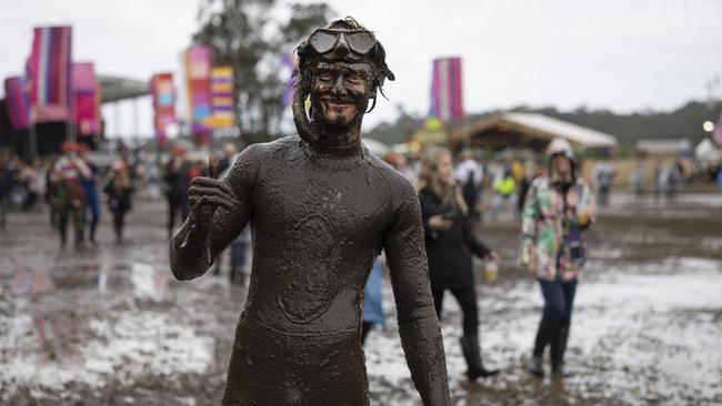 A festival-goer makes good use of a snorkel on Friday. Picture: Getty Images