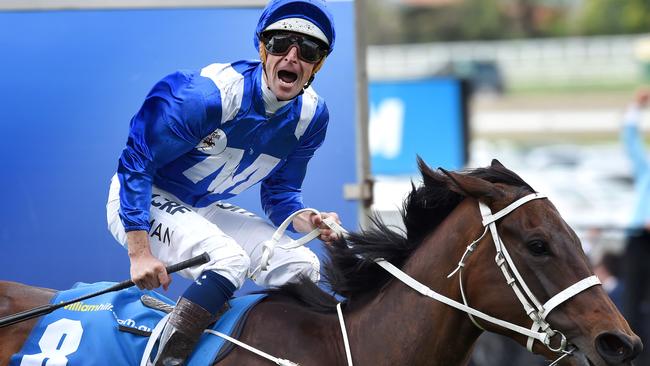 Hugh Bowman and Winx create history by recording the greatest winning margin in a Cox Plate. Picture: Nicole Garmston