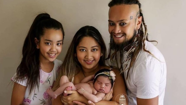 Rah Tamati with partner April and two daughters.