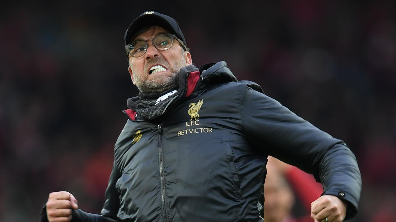 Liverpool's German manager Jurgen Klopp reacts to their victory on the pitch