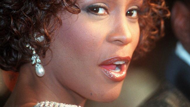 Whitney Houston with her husband Bobbi Brown  the premiere of movie 