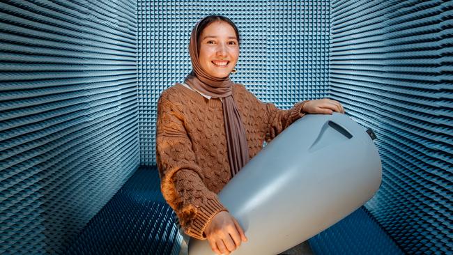 Masooma Alizada is an aeronautical engineering student doing an internship at Airspeed, Mawson Lakes. Masooma is standing in an anechoic chamber she designed and built. Picture Matt Turner.