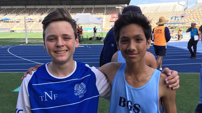 Alex Thakur (right) and Alex Romano were first and second for Grammar and Nudgee at the GPS Track and Field.