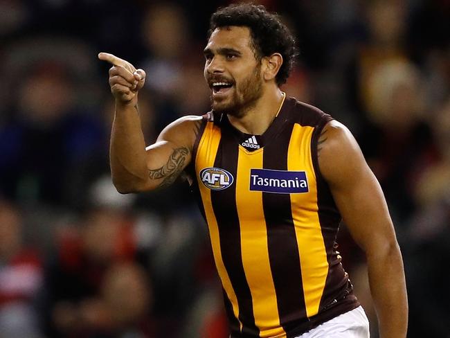 MELBOURNE, AUSTRALIA - JUNE 10: Cyril Rioli of the Hawks celebrates a goal during the 2016 AFL Round 12 match between the Essendon Bombers and the Hawthorn Hawks at Etihad Stadium on June 10, 2016 in Melbourne, Australia. (Photo by Adam Trafford/AFL Media/Getty Images)