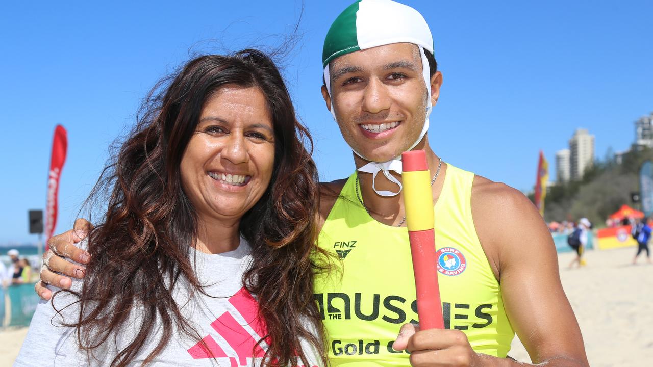 Tynan Neveceral celebrates his win in the Under 15 flags final with mum Shenny Picture: Harvpix