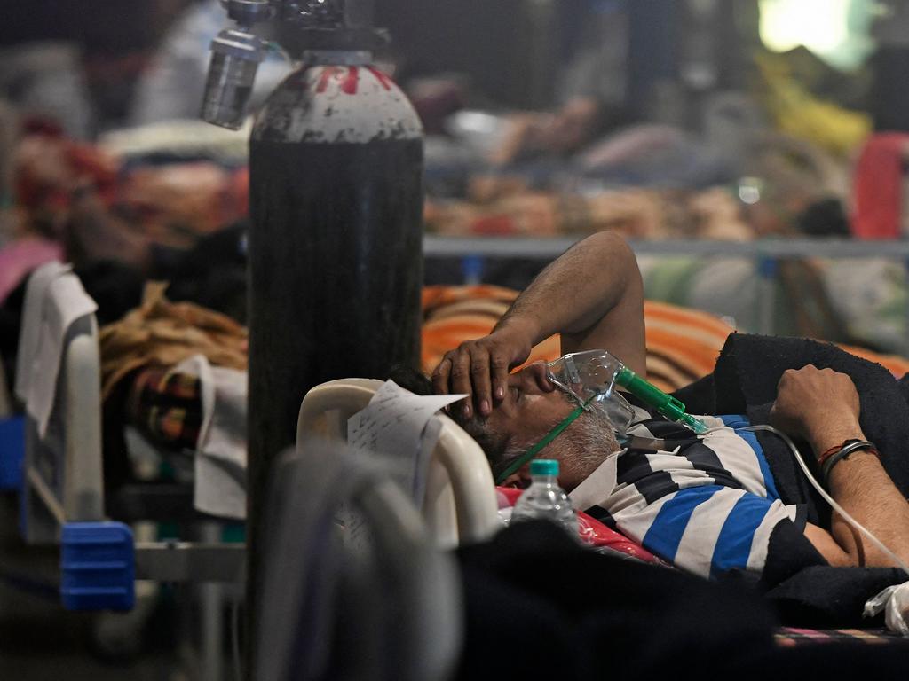 COVID-19 positive patients inside a banquet hall temporarily converted into a COVID care centre in New Delhi. Picture: Tauseef Mustafa/AFP