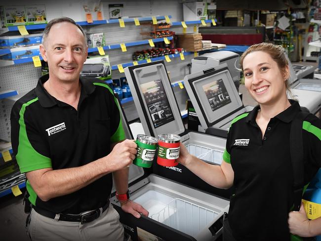 Aussies race to get camping gear to holiday at home. Pictured, assistant manager Bill Jones and camping expert Simone Bassett of Tentworld, Warana, have been inundated with sales. Photo: Patrick Woods