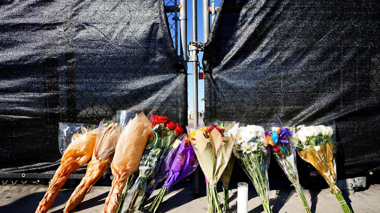 Tributes and flowers are laid at the site. Picture: Getty