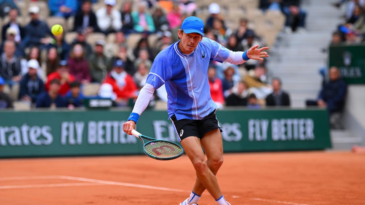 PARIS, FRANCE - MAY 28: Alex De Minaur of Australia plays a backhand against Alex Michelsen of United States in the Men's Singles first round match on Day Three of the 2024 French Open at Roland Garros on May 28, 2024 in Paris, France. (Photo by Clive Mason/Getty Images)