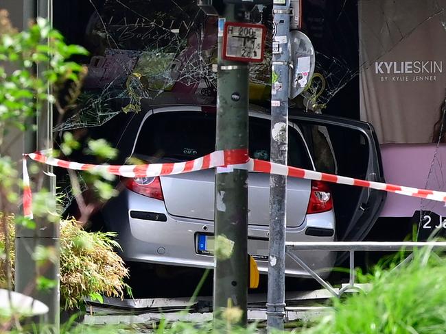 The car crashed into a shop window after ploughing into a crowd, at the corner of Tauentzienstrasse and Marburger Strasse in central Berlin. Picture: John Macdougall / AFP.