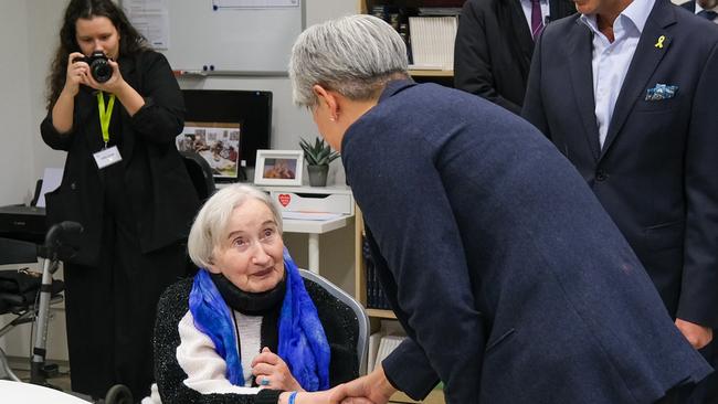 Senator Wong meets Holocaust survivor Zofia Radzikowska at the Jewish Community Centre in Krakow. Picture: Jacquelin Magnay