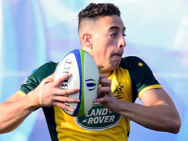 ROSARIO, ARGENTINA - JUNE 22: Mark Nawaqanitawase of Australia U20 runs to score a try during the final match of World Rugby U20 Championship 2019 between Australia U20 and France U20 at Racecourse Stadium on June 22, 2019 in Rosario, Argentina. (Photo by Amilcar Orfali/Getty Images)