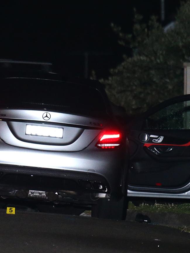 A Mercedes, believed to be Barbaro’s, sits with the door still open. Picture: Bill Hearne