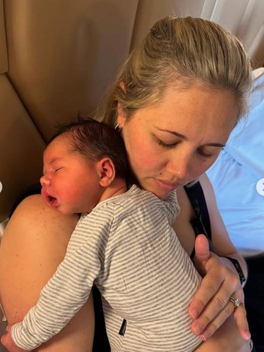 Ex-Cat Isaac Smith has shared new baby news via Instagram, announcing the arrival of son Pierce Laurence born May 4, pictured with new mum Candice. Picture: Instagram