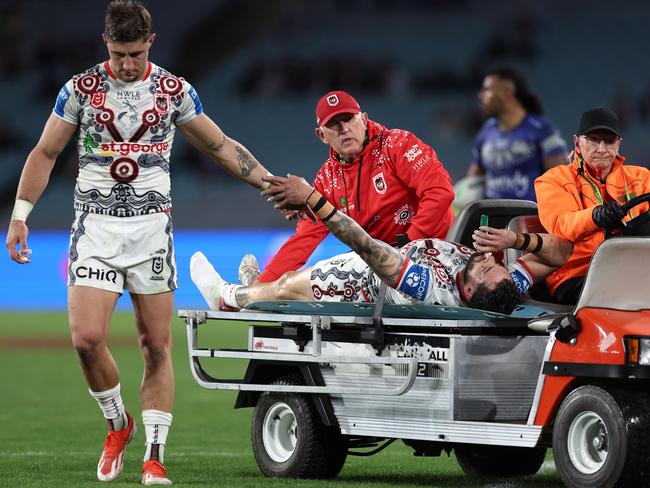 Zac Lomax of the Dragons checks up on Jack Bird of the Dragons as he is stretchered off the field after an ankle injury Picture: Cameron Spencer/Getty Images