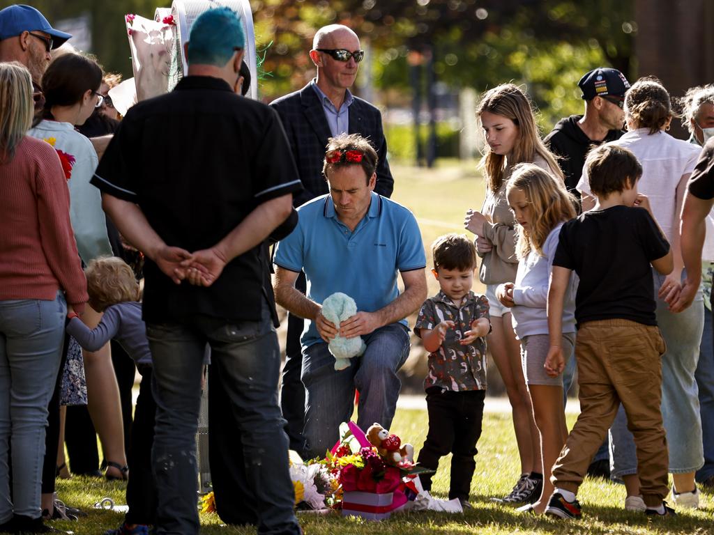 FamilyÃ&#149;s lay Flowers and Toys to remember lost one in the Hillcrest tragedy in Market Square in Devonport. Thursday December 15th 2022. Picture: Grant Viney