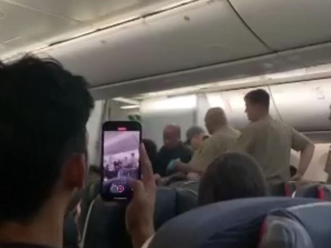 A passenger has allegedly choked out a flight attendant while on board an Air Canada flight from Vancouver to Brisbane.