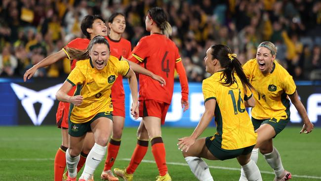 SYDNEY, AUSTRALIA - JUNE 03: Clare Wheeler of Australia celebrates scoring a goal during the international friendly match between Australia Matildas and China PR at Accor Stadium on June 03, 2024 in Sydney, Australia. (Photo by Mark Metcalfe/Getty Images)