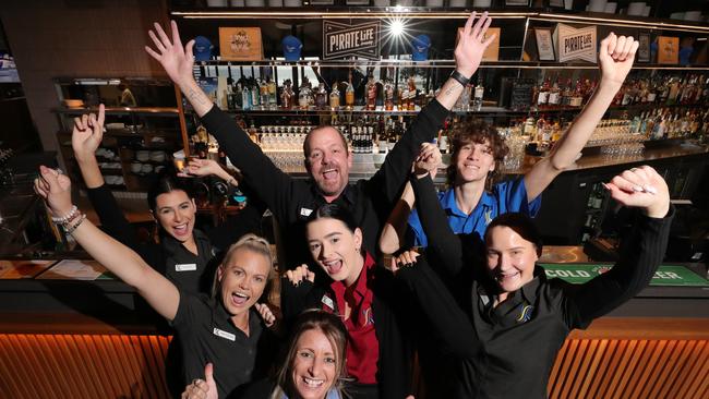 Kurrawa Surf Club staff Sharni Cogswell, Hayleigh Studdon, Amber Collyer, Jessica Smith, Mark Edwards, Jarred Sharman and Erin Burns. Picture: Glenn Hampson.