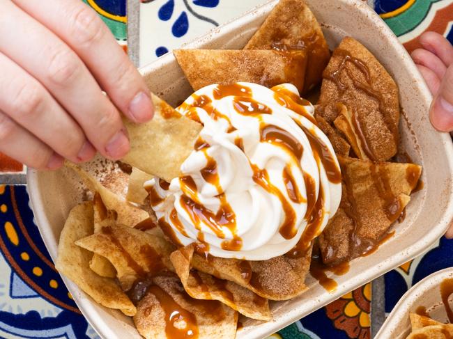 EMBARGOED TO MONDAY 930AM: A favourite Aussie brand is launching a surprise new product for customers to enjoy over summer.Devoted customers of Guzman y Gomez will now be able to get the “dessert of their dreams”, a never-before-seen GYG Nacho Sundae. Picture: Supplied