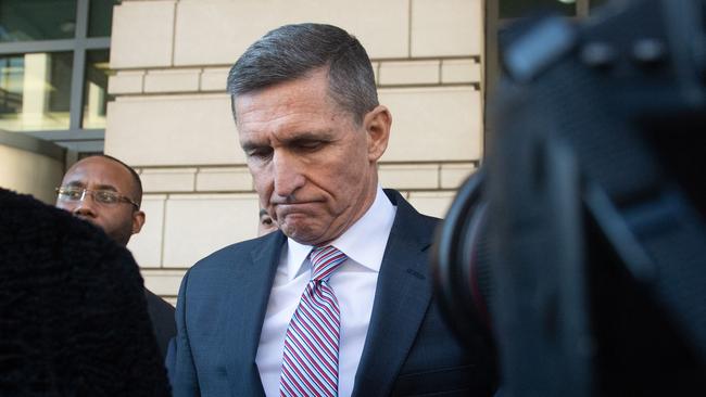 Former national security adviser Michael Flynn leaves court in Washington. Picture: AFP.