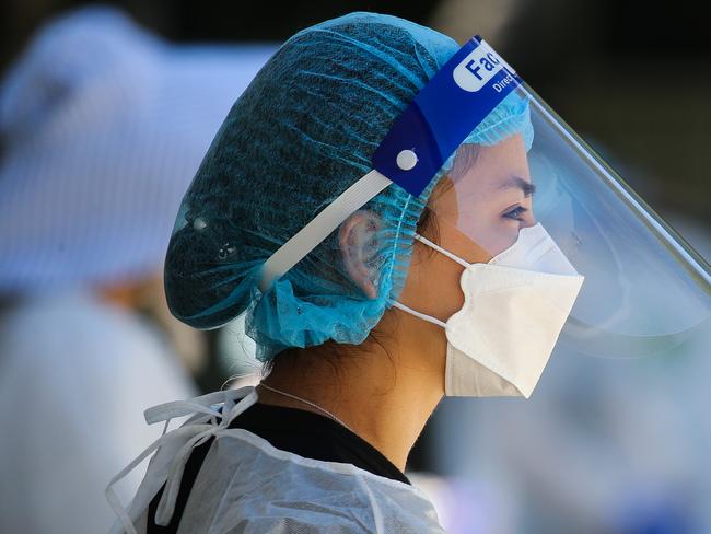 SYDNEY, AUSTRALIA - NewsWire Photos, SEPTEMBER, 20 2021: Nurses are seen conducting Covid-19 Tests at the Killara Drive Through testing Clinic in Sydney. Picture: NCA NewsWire / Gaye Gerard