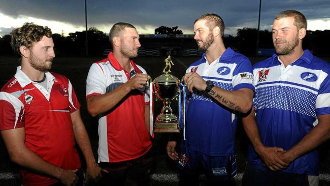 BROTHERS AT ARMS: South Grafton Rebels brothers Kieren and Cameron Stewart grapple for the Viv Hodge Memorial Trophy against GRafton Ghosts brothers Brett and Danny Wicks. Picture: Matthew Elkerton