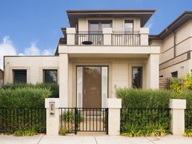 Generic istock townhouses. Urban infill, Torrens-title property, close neighbours.