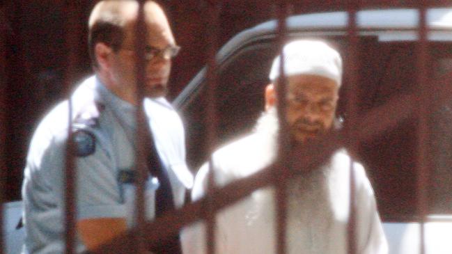 Muslim cleric Abdul Nacer Benbrika, home-grown terrorist organisation head is led from the Supreme Court.