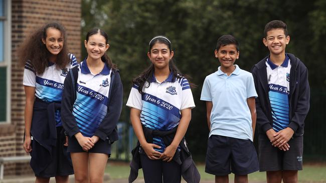 Students from Belmore North Public School, Makayla Van Der Walle, Kelsey Guirguis, Ashita Shraya, Wajahath Ali Khan and Erik Crichton practice their times tables. Picture: Brett Costello