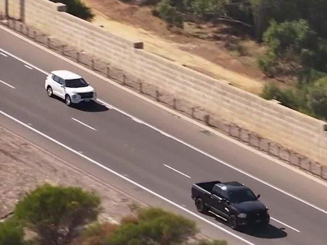 Harrison McElroy and his partner were struck by a Volvo after getting out of a car they had parked in the emergency lane of a highway south of Perth. Picture: 9News