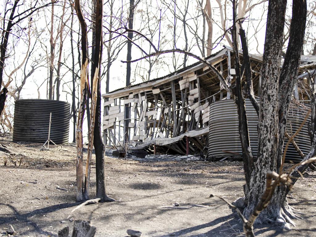 A badly damaged house at Timbarra Drive. Picture: Nigel Hallett.