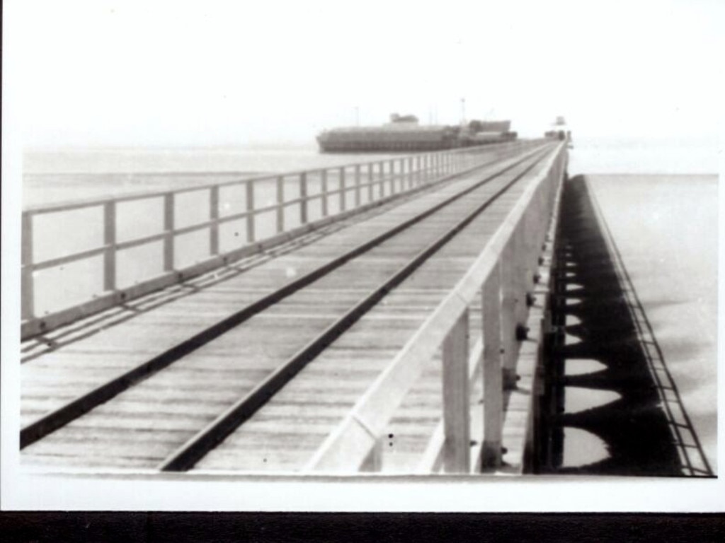 The Urangan Pier has changed a lot since it was first built in 1917 when it stretched more than a kilometre into the sea. Credit: Hervey Bay Historical Village & Museum.