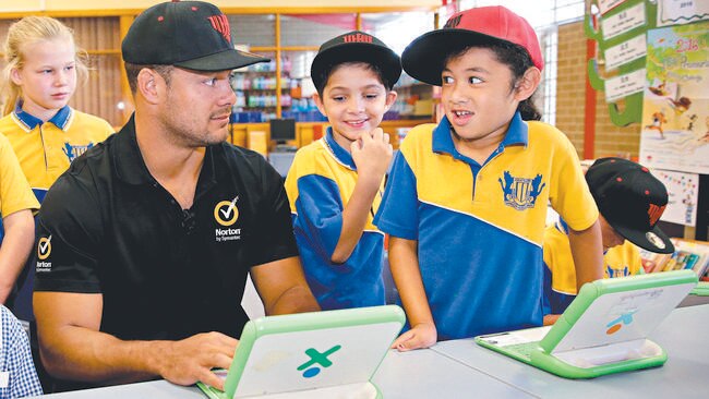 Jarryd Hayne returns to his Primary School John Warby Public School in Airds to talk to kids about cyber bullying. Picture Gregg Porteous