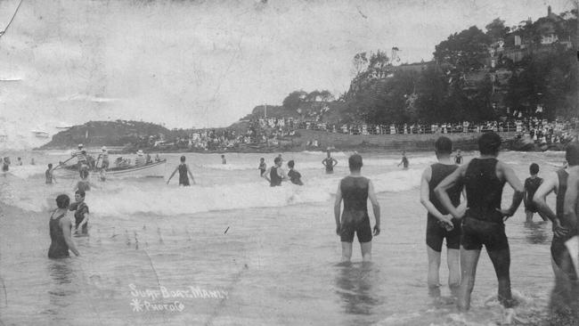 Members of the Sly family in Manly Council's surfboat at Manly. Picture Northern Beaches Library