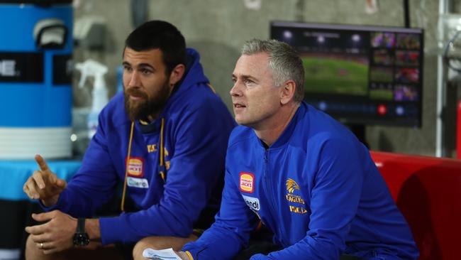 West Coast coach Adam Simpson, right, said the Eagles will catch a glimpse of what life after Josh Kennedy is like when they play Essendon on Tuesday night. Picture: Getty Images