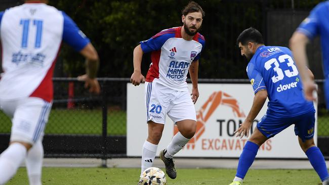 Port Melbourne’s Josh Markovski looking for teammate. Picture: Andrew Batsch