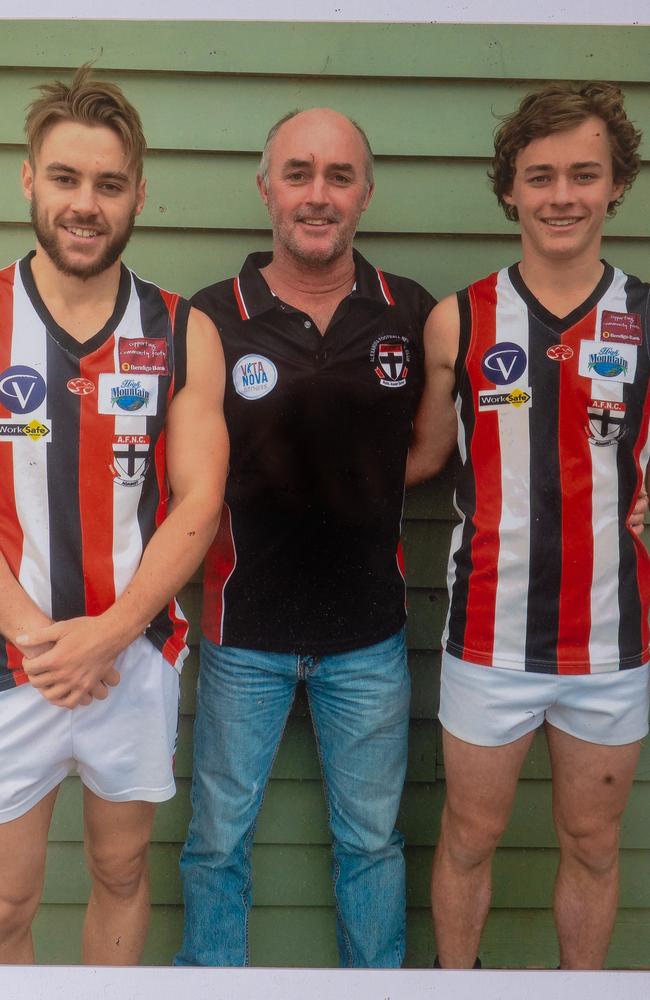 Jordan (right) with his father, Michael Purcell, and brother Lyndon (left).