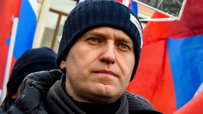 (FILES) Russian opposition leader Alexey Navalny attends an opposition march in memory of murdered Kremlin critic Boris Nemtsov in central Moscow on February 25, 2018. Russian opposition leader Alexei Navalny died on February 16, 2024 at the Arctic prison colony where he was serving a 19-year-term, Russia's federal penitentiary service said in a statement. (Photo by Vasily MAXIMOV / AFP)