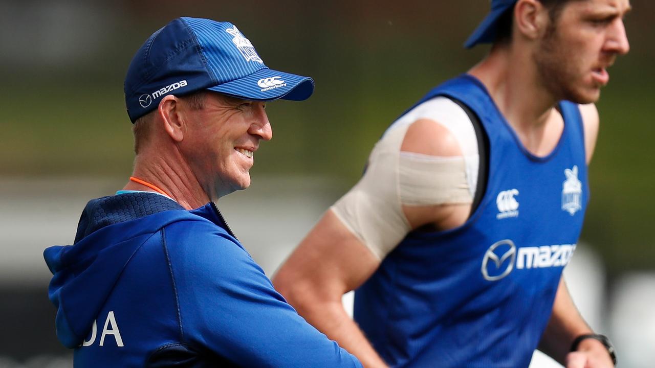 New Kangaroos coach David Noble keeps an eye on his players at Arden St.